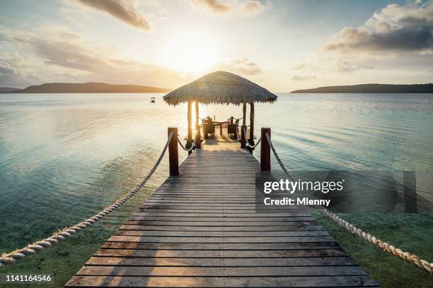 vanuatu romantic sunset jetty efate island - port vila stock pictures, royalty-free photos & images