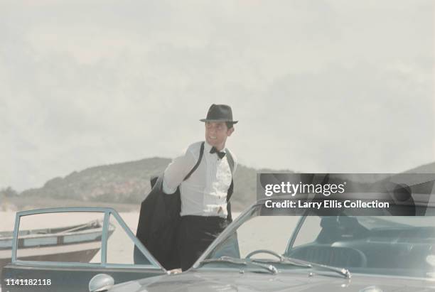 Australian actor George Lazenby films a scene for the James Bond movie 'On Her Majesty's Secret Service' on location on the Praia do Guincho , near...