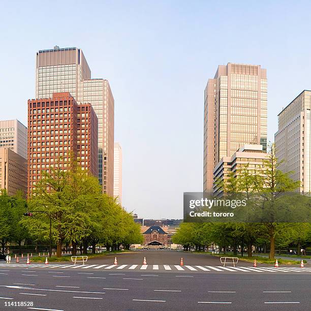 tokyo station and skyscrapers - tokyo station stock pictures, royalty-free photos & images