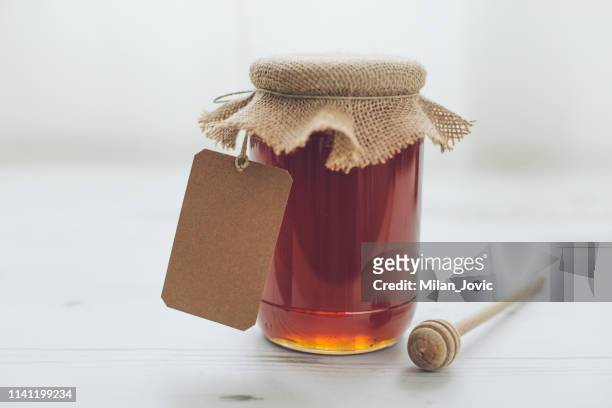 jar of honey - manuka honey stock pictures, royalty-free photos & images