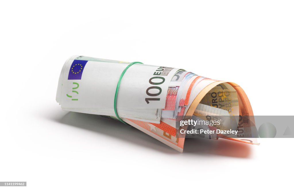Euro banknotes in a money roll