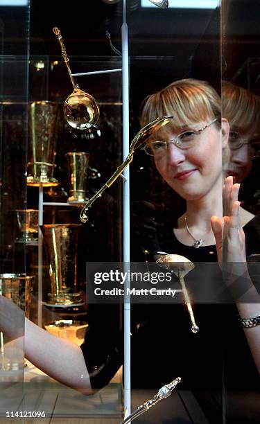 Suzi Lubaczewska looks at artworks displayed at a preview of the new Holburne Museum ahead of its reopening on May 12, 2011 in Bath, England. The new...