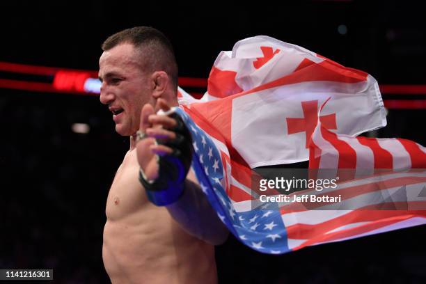 Merab Dvalishvili of Georgia celebrates his victory over Brad Katona of Canada in their bantamweight bout during the UFC Fight Night event at...