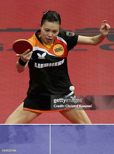 Wu Jiaduo of Germany plays a backhand during the Round of 16 Women's Single match between Wu Jiaduo of Germany and Guo Yue of China during the World...