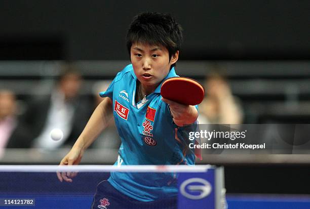 Guo Yue of China plays a backhand during the Round of 16 Women's Single match between Wu Jiaduo of Germany and Guo Yue of China during the World...