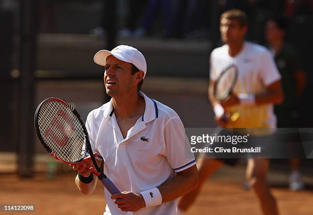 Daniel Nestor of Canada and Max Mirnyi of Belarus in action against Simone Bolelli and Fabio Fognini of Italy during day five of the Internazoinali...