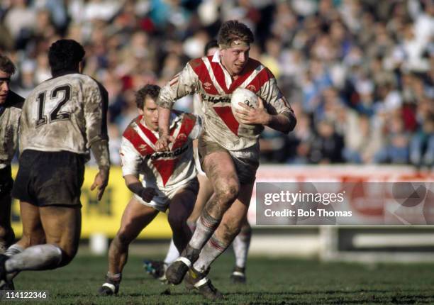 Roy Haggerty of St Helens attempts to move past Emosi Koloto of Widnes during the Silk Cut Challenge Cup Rugby League Semi-final at Wigan on 11th...