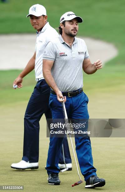 Victor Dubuisson of France reacts after playing a shot during the final round of the 2019 Volvo China Open at Genzon Golf Club on May 5, 2019 in...