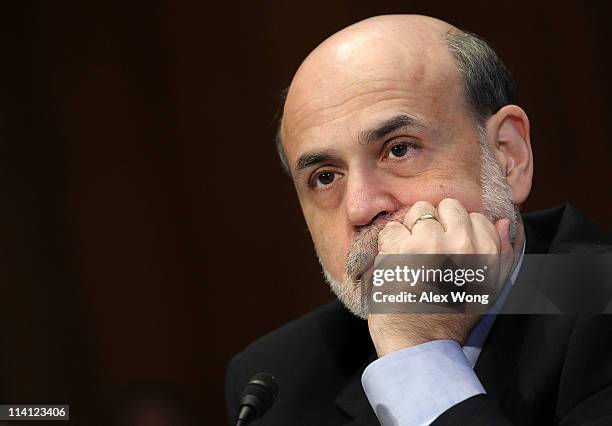 Federal Reserve Chairman Ben Bernanke listens during a hearing before Senate Banking, Housing and Urban Affairs Committee May 12, 2011 on Capitol...