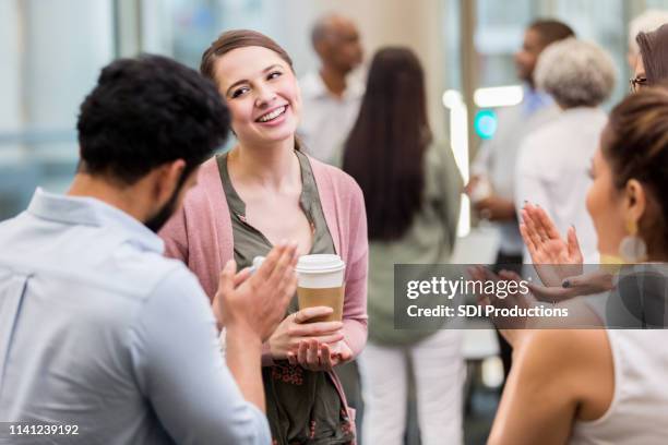 businesspeople applaud colleague - applauding leader stock pictures, royalty-free photos & images