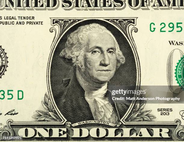 us currency one dollar bill close up view - eén dollar amerikaanse dollar stockfoto's en -beelden