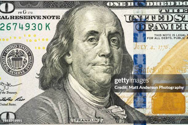 us currency one dollar bill close up view - benjamin franklin stock-fotos und bilder