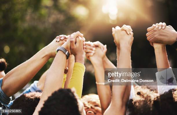 we have all the support we need - group of people holding hands stock pictures, royalty-free photos & images