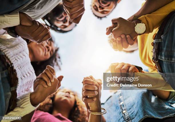 friends are there when you need them most - black woman praying stock pictures, royalty-free photos & images