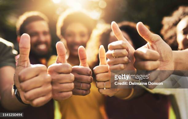 friendship will turn that frown upside down - thumbs up stock pictures, royalty-free photos & images
