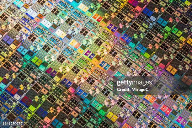 intricacy of silicon computer wafer - silicium photos et images de collection