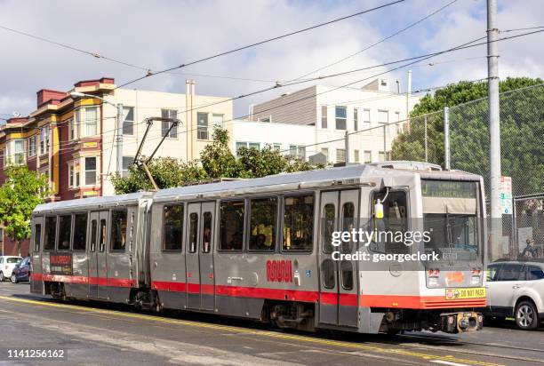 muni lightrail in san francisco - castro district stock pictures, royalty-free photos & images