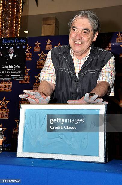 Argentine songwriter Alberto Cortez prints the track of his hands at Plaza de las Estrellas on 11 May, 2011 in Mexico City, Mexico