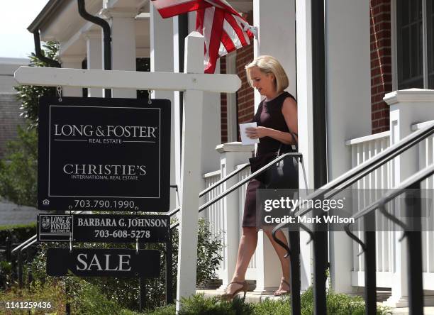 Outgoing Department of Homeland Security Secretary Kirstjen Nielsen walks out of her home to speak to the media on April 08, 2019 in Alexandria,...