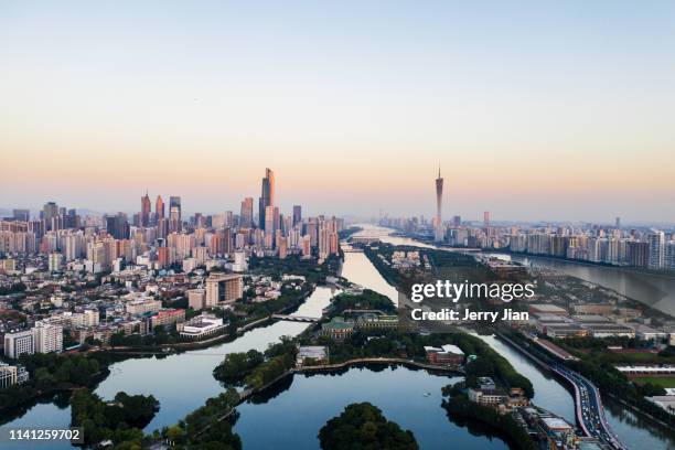 city sunset with red sky,guangzhou - guandong stock pictures, royalty-free photos & images