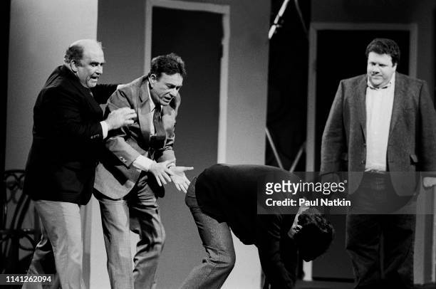 View of American actors, from left, Ed Asner, Shelley Berman , Fred Willard, and George Wendt as they perform onstage during the Second City 25th...
