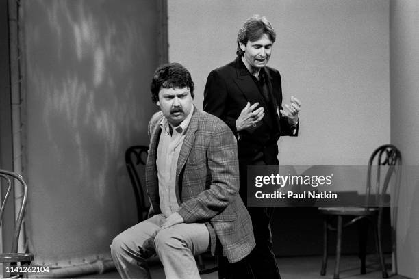 American comedian Mike Hagerty and Canadian comedian David Steinberg perform onstage during the Second City 25th Anniversary performance at the Vic...