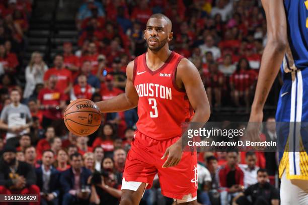 Chris Paul of the Houston Rockets handles the ball against the Golden State Warriors during Game Three of the Western Conference Semifinals of the...