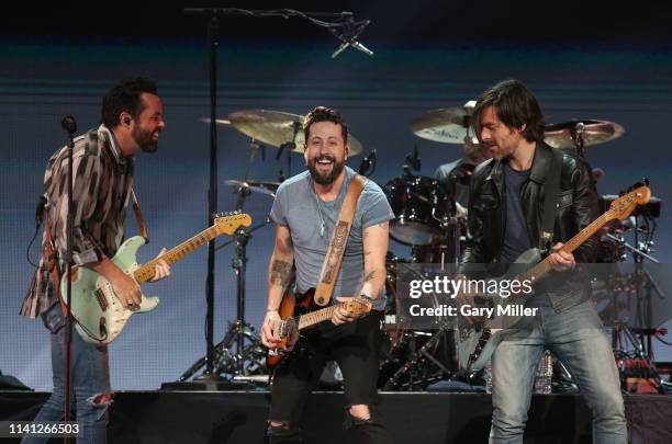 Brad Tursi, Matthew Ramsey, and Geoff Sprung of Old Dominion perform onstage during the 2019 iHeartCountry Festival Presented by Capital One at the...