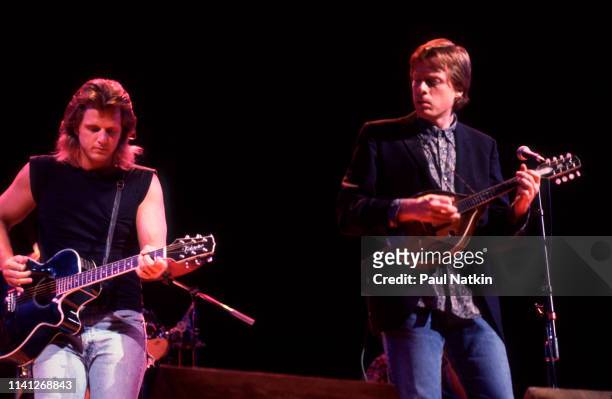 Portrait of American Country group the O'Kanes as they perform onstage at the Holiday Star Theater, Merillville, Indiana, April 6, 1987. Pictured are...