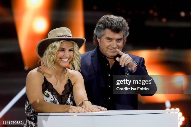 Swiss singer Beatrice Egli and Austrian singerAndy Borg during the television show 'Willkommen bei Carmen Nebel' at Velodrom on May 4, 2019 in...