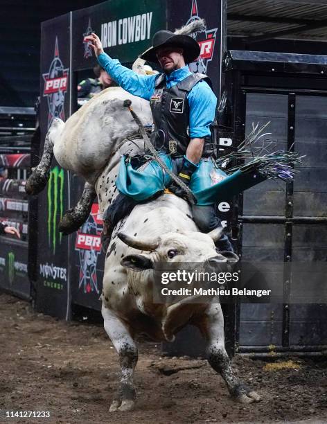 Marcus Mast of the USA rides Flash Forward during the PBR Monster Energy Tour Professional Bull Riders event at Videotron Centre on May 4, 2019 in...