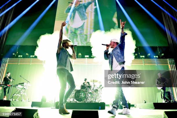 Brian Kelley and Tyler Hubbard of Florida Georgia Line perform onstage during the 2019 iHeartCountry Festival Presented by Capital One at the Frank...