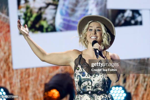 Swiss singer Beatrice Egli performs during the television show 'Willkommen bei Carmen Nebel' at Velodrom on May 4, 2019 in Berlin, Germany.