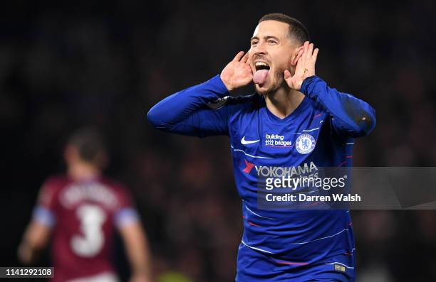Eden Hazard of Chelsea celebrates after scoring his team's first goal during the Premier League match between Chelsea FC and West Ham United at...