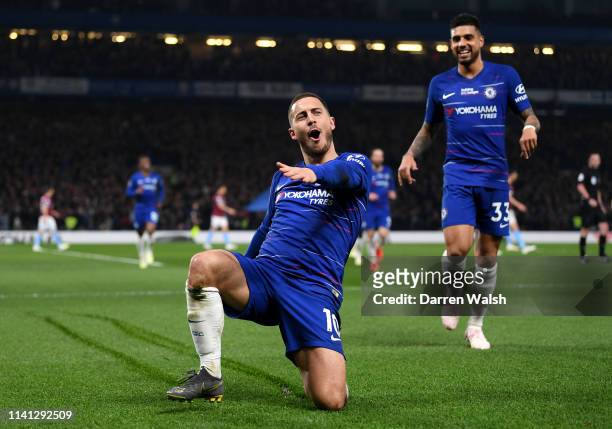 Eden Hazard of Chelsea celebrates after scoring his team's first goal during the Premier League match between Chelsea FC and West Ham United at...
