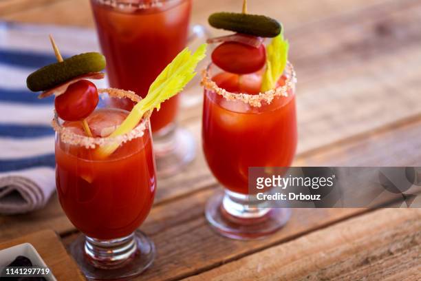 bloody mary cocktail in glass, close-up - bloody mary stock pictures, royalty-free photos & images