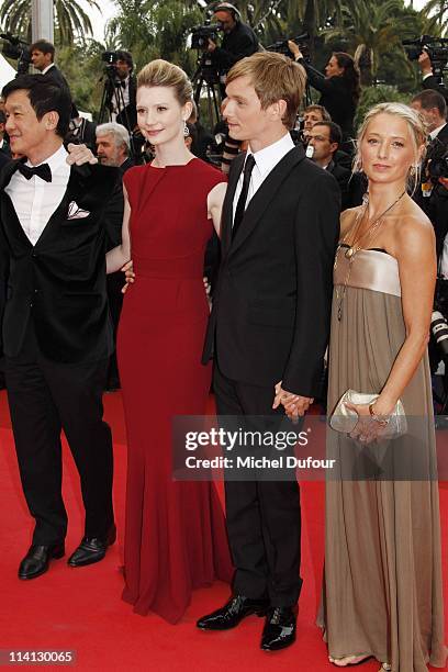 Jason Lew, Mia Wasikowska, Henry Hopper and guest attend the 'Sleeping Beauty' premiere during the 64th Annual Cannes Film Festival at Palais des...