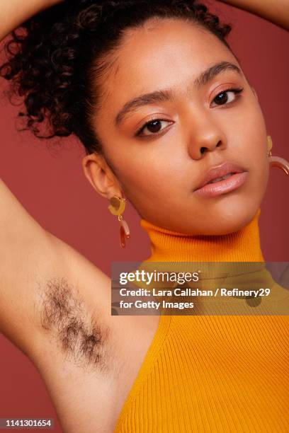 portrait of young confident women with arm pit hair - female armpits imagens e fotografias de stock