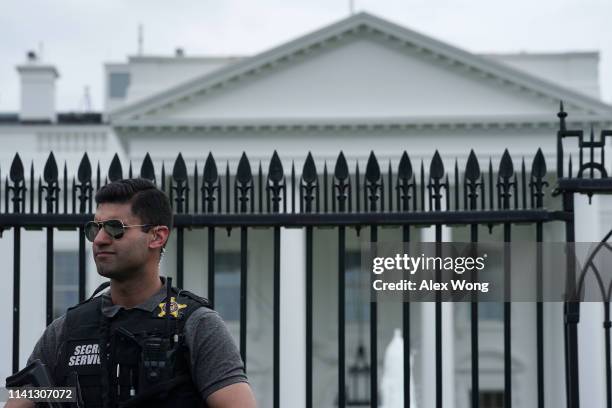 Member of the U.S. Secret Service Uniformed Division stands guard outside the White House on April 08, 2019 in Washington, DC. Today it was announced...