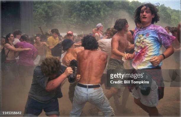 June 21, 1993 ]: Moshing during the Lollapalooza music festival on June 21, 1993 in New York City.