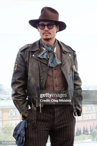 Actor Johnny Depp poses for a photocall before the Russian premiere of the film 'Pirates Of The Caribbean: On Stranger Tides' on the roof of the Ritz...