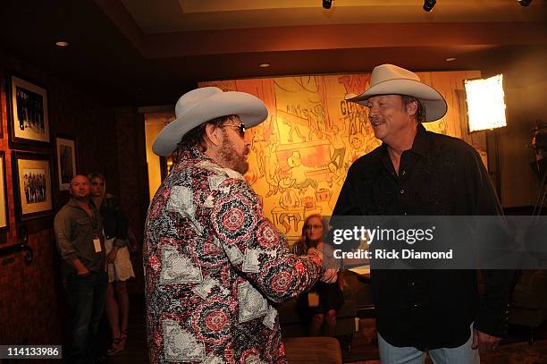 Hank Williams Jr. And Alan Jackson attend Music Builds: the CMT Disaster Relief Concert on May 12, 2011 in Nashville, Tennessee.