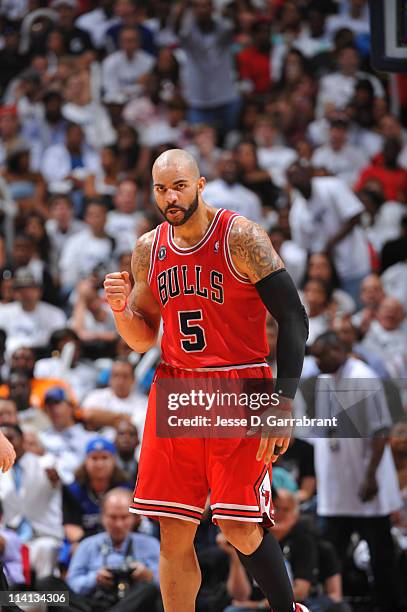 Carlos Boozer of the Chicago Bulls reacts after a play against the Atlanta Hawks during Game Six of the Eastern Conference Semifinals in the 2011 NBA...
