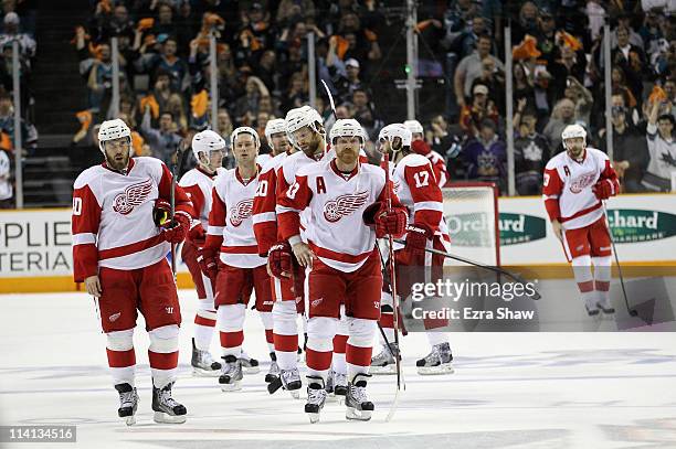 The Detroit Red Wings wait to shake hands with the San Jose Sharks after they lost Game Seven of the Western Conference Semifinals during the 2011...