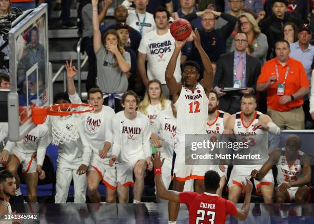 De'Andre Hunter of the Virginia Cavaliers shoots the ball against the Texas Tech Red Raiders during the second half of the 2019 NCAA Photos via Getty...