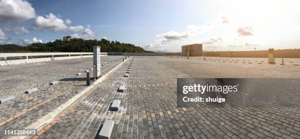 parking lot at the top floor of sanya airport building - concrete footpath stock pictures, royalty-free photos & images