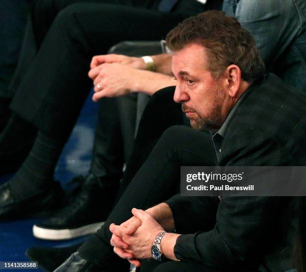 New York Knicks owner James Dolan reacts as he watches an NBA basketball game against the Toronto Raptors from his front row seat on March 28, 2019...