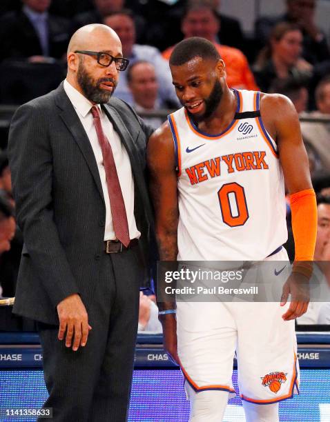 Head coach David Fizdale of the New York Knicks talks with Kadeem Allen of the Knicks during an NBA basketball game against the Toronto Raptors on...