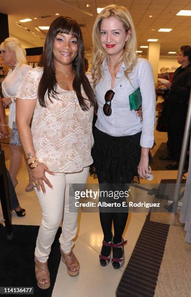 Designer Simone I. Smith and actress Lauren Storm attend a personal appearance by Simone I. Smith at Bloomingdale's on May 12, 2011 in Century City,...