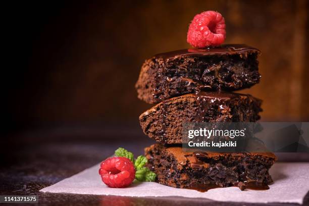 homemade chocolate brownies - fudge sauce stock pictures, royalty-free photos & images